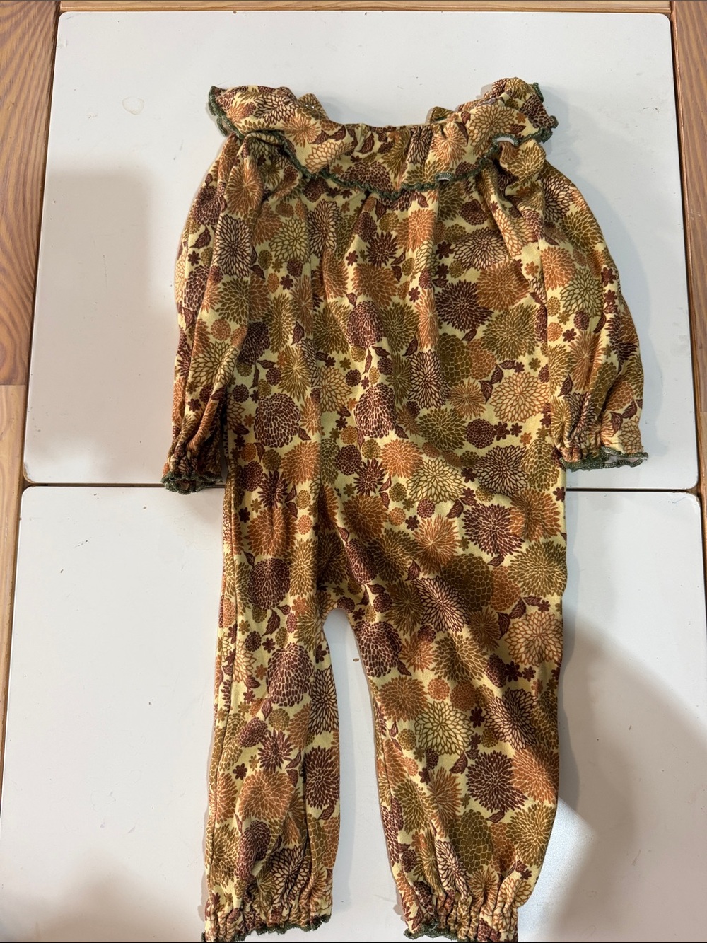 Misha And Puff Floral Ruffle Jumpsuit in Brown & Olive